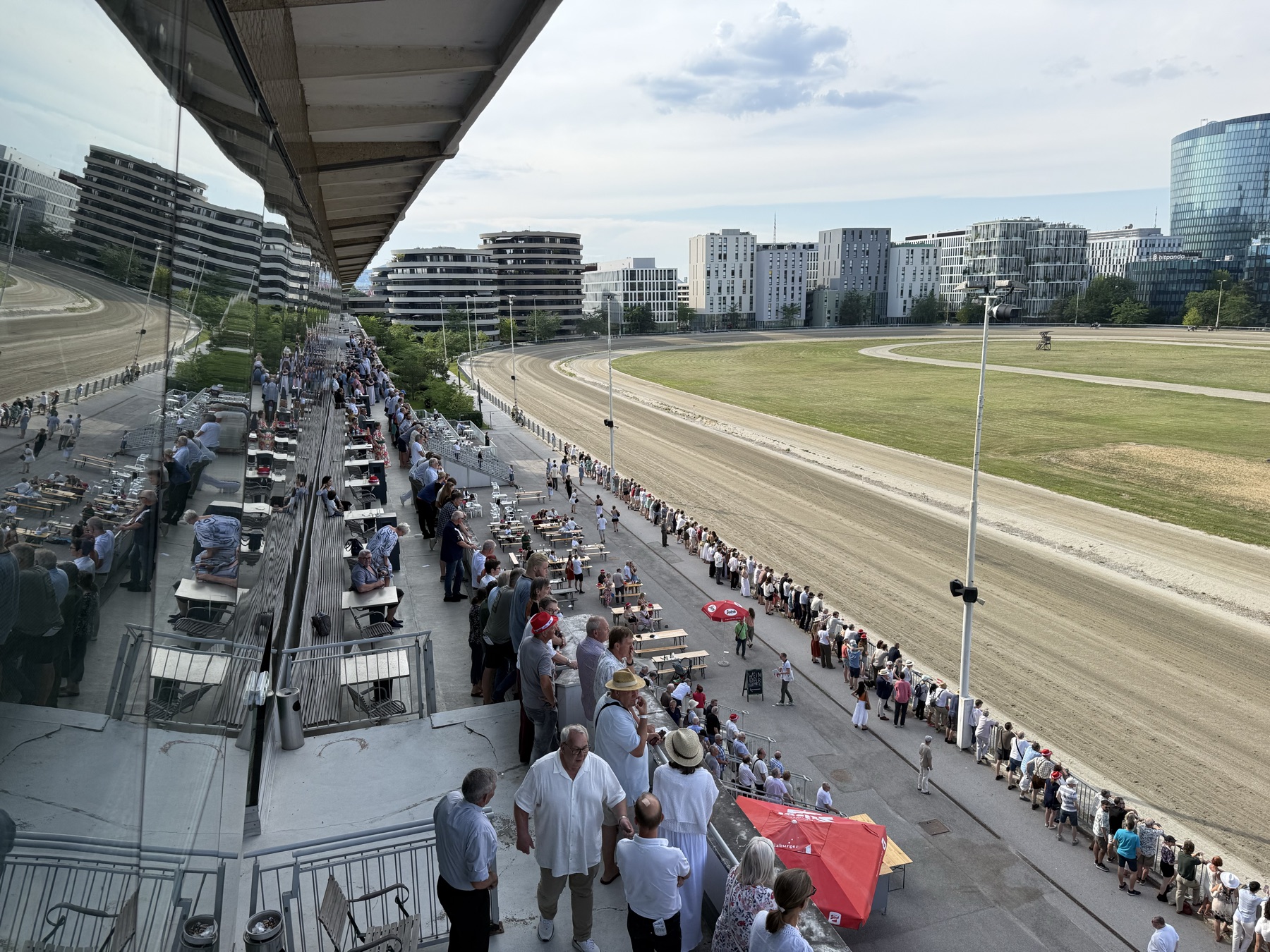 Krieau Derby grandstand and race-day crowd beside the track